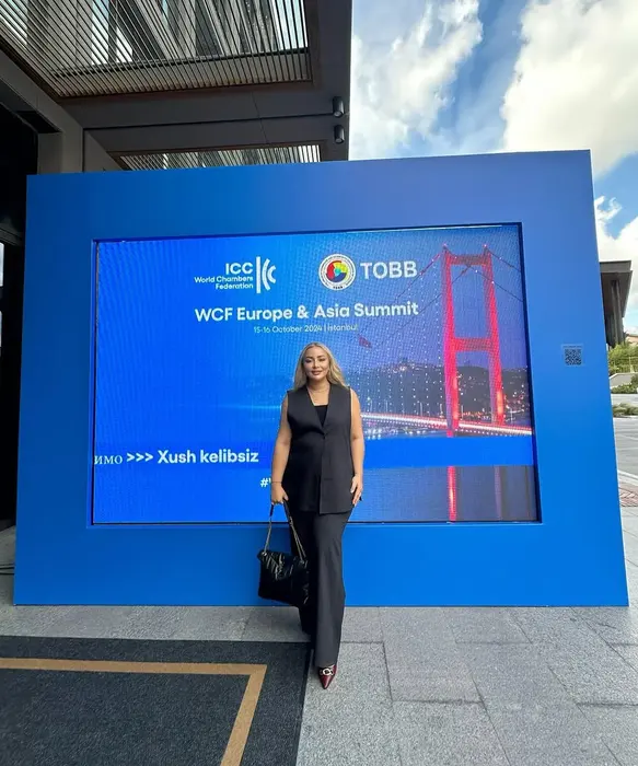 In front of the WCF Europe & Asia Summit main stage
